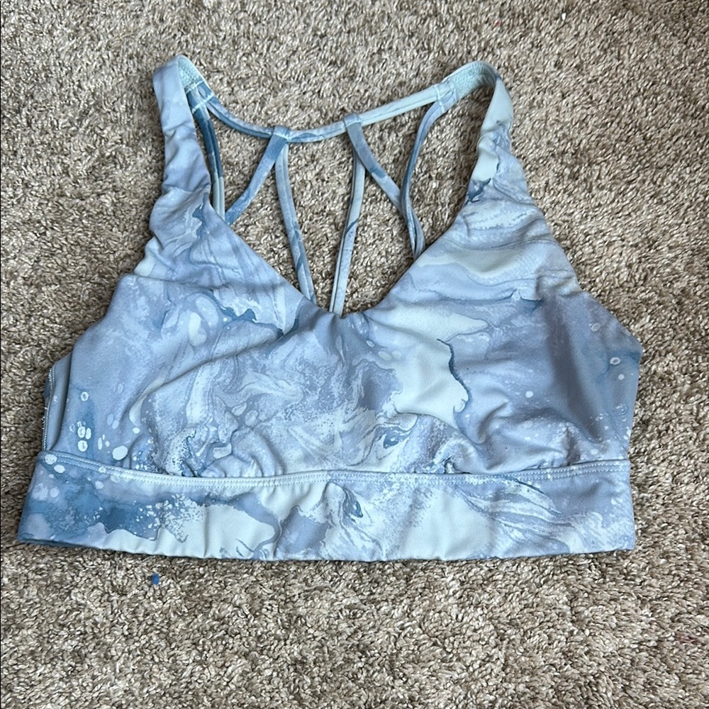 Blue Sports Bra with Strappy Back Design and Moisture-Wicking Fabric